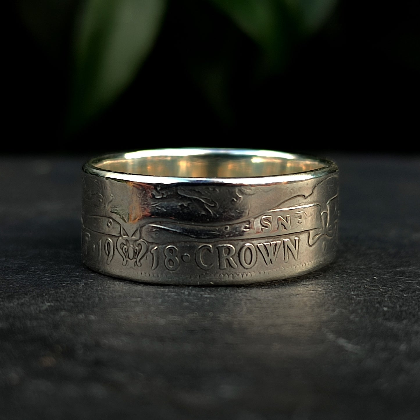 The Silver Half Crown Ring 1918 by silverhollowjewellery is crafted from an original 1918 coin, featuring engraved text and preserved details for unique handmade recycled jewelry with historic charm.