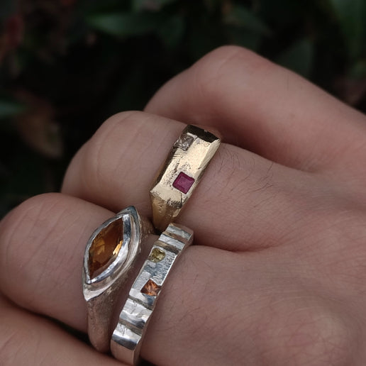 Handmade bespoke sapphire rings in silver and gold