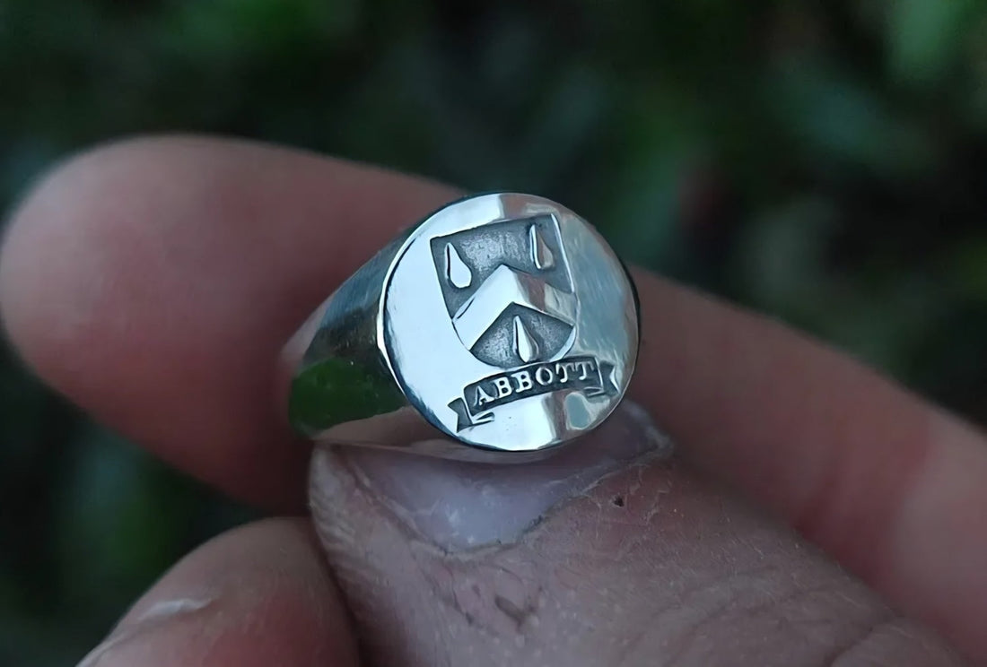 Custom engraved family crest signet ring in sterling silver